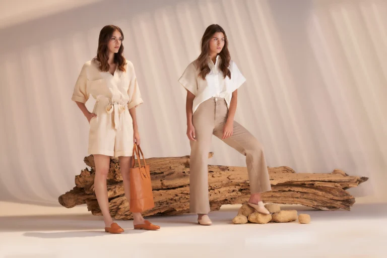 woman-standing-against-wall-wearing-sustainable-fashion